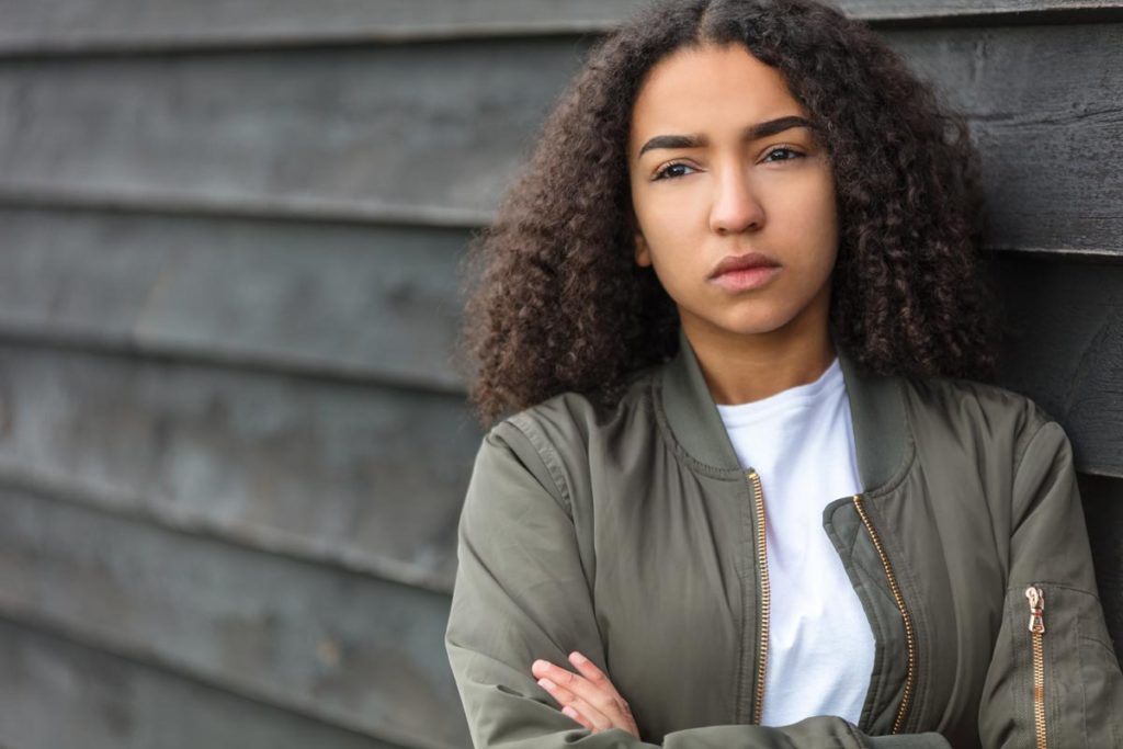 photo of a beautiful mixed-race lady worrying about many things