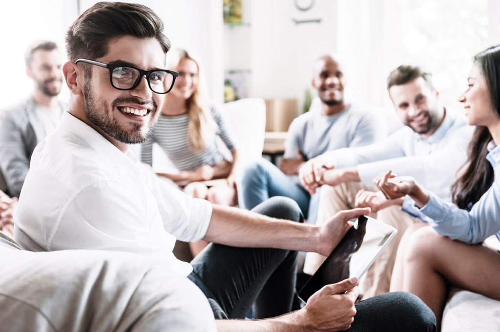 photo of people during a group therapy at a rehab center