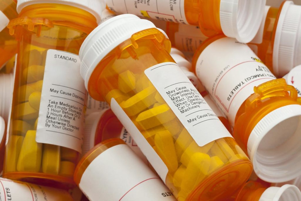 Bottles of prescription medicine in a pile