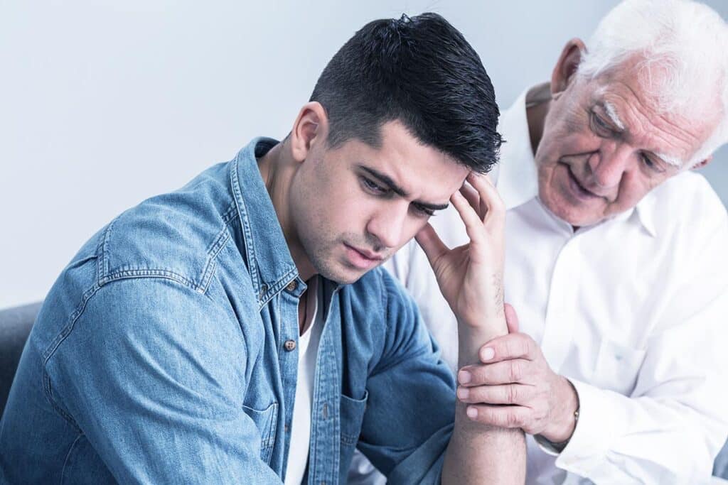a father trying to communicate to his addicted young adult son