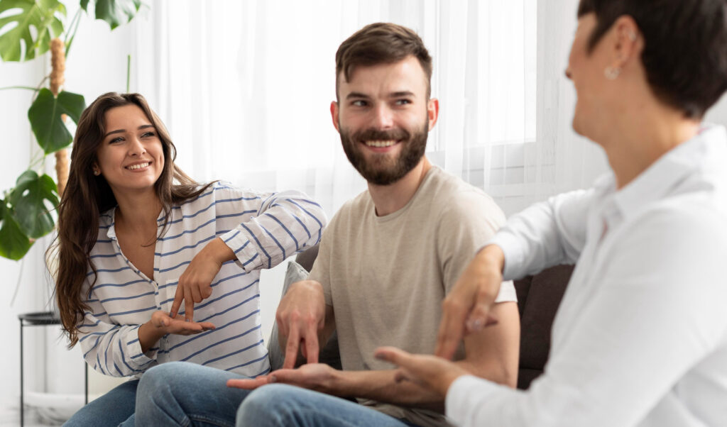 A therapist playing a humorous game with her patients; humor is a great tool to beat addiction.