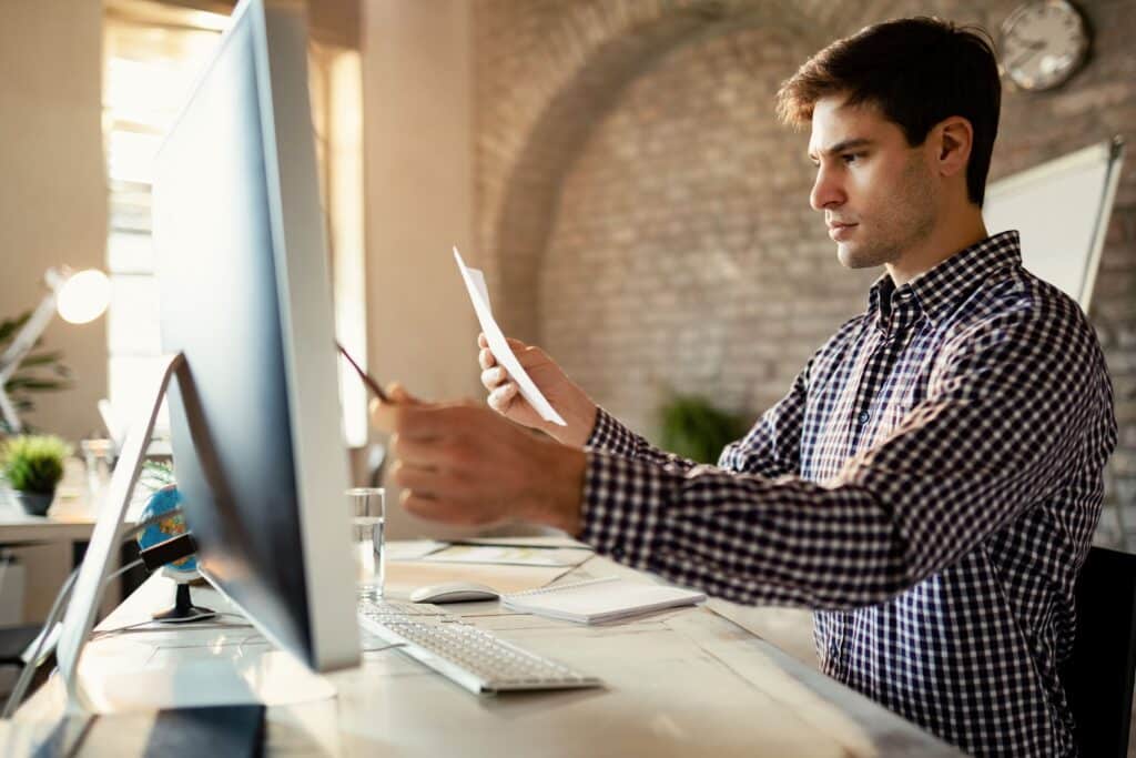 A young man verifying his insurance benefits for addiction treatment.