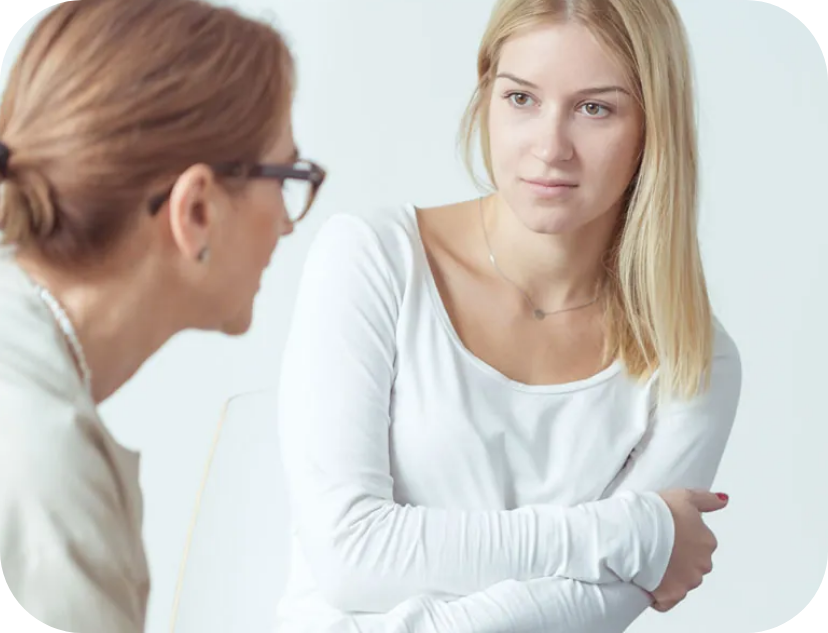 A young lady speaking with a Costa Mesa drug counselor.