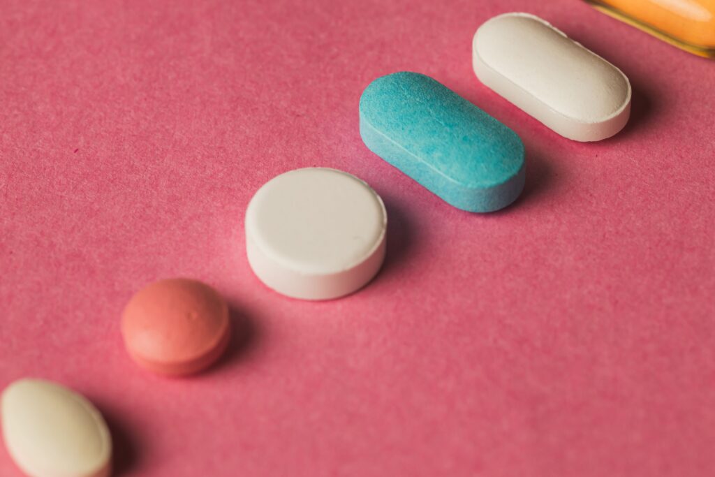 Trazodone for Sleep-closeup-of-pills-arranged-on-a-pink-surface-2023-11-27-05-09-19-utc.jpg