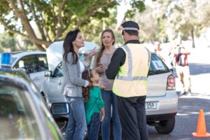 Can you refuse a field sobriety test in LA?-people-and-policeman-at-car-accident-scene-2024-09-15-06-07-44-utc (1).jpg