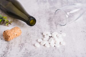 What happens when you mix phenibut with alcohol, and what are the risks?-sobriety-concept-alcoholism-pills-bottle-and-gla-2023-12-12-01-50-32-utc (1).jpg